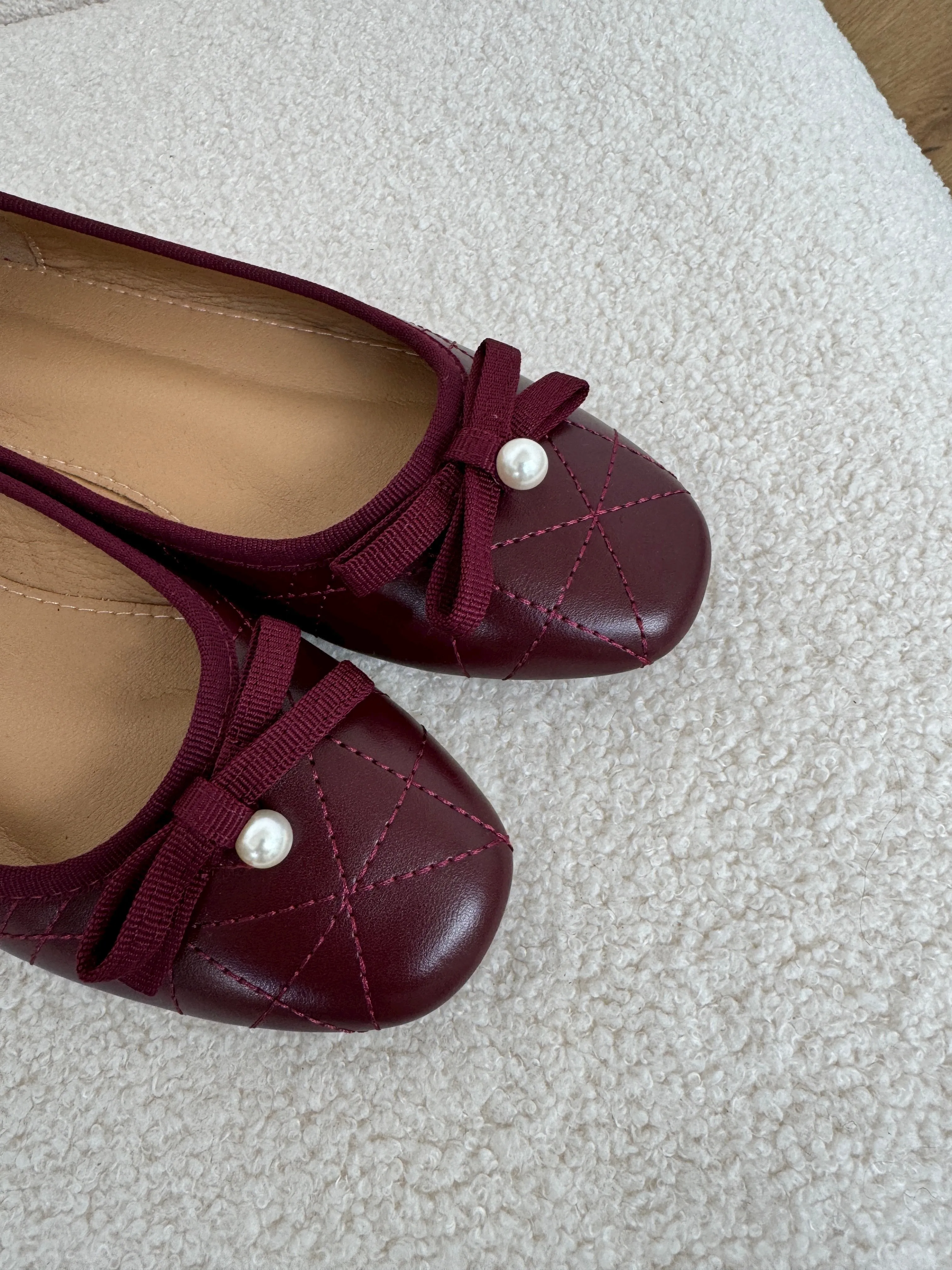 ria ballet flats in burgundy